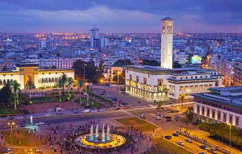 Morocco, Casablanca, Place Mohammed V.The Palais de Justice (law courts) building on the left and the Ancienne Prefecture (Old Police Station) on the right.